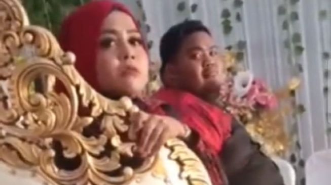 Tangkapan Layar Video Viral Geger Istri Jijik Lihat Suami di Pelaminan, Ternyata Hanya Drama Kru Pernikahan (TikTok/@viqar69).